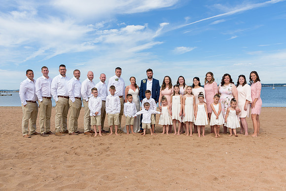 25 person bridal party with kids on the beach at Anthony's Ocean View in New Haven, Connecticut