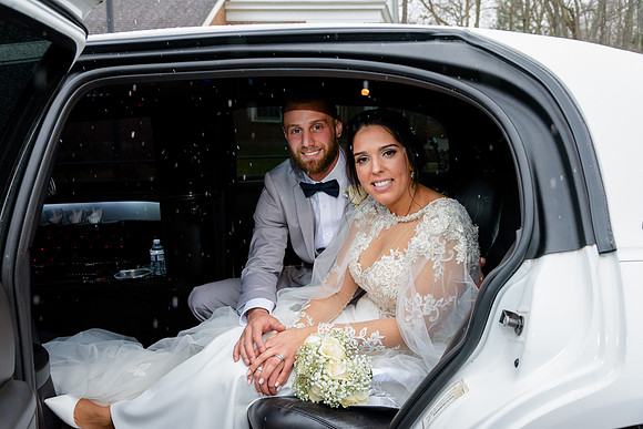 Bride and groom in Limousine at Aria in Prospect Connecticut