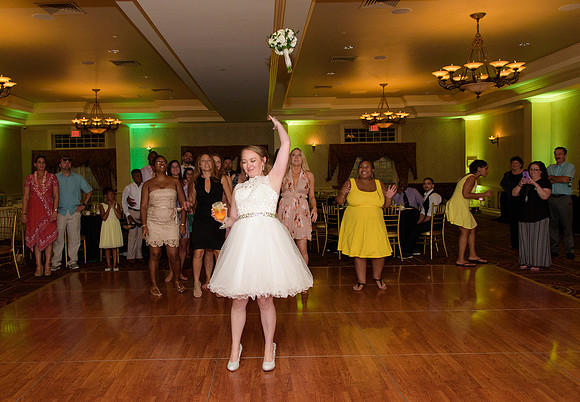 Bouquet Toss at St. Clements Castle Wedding Reception in Portland Connecticut