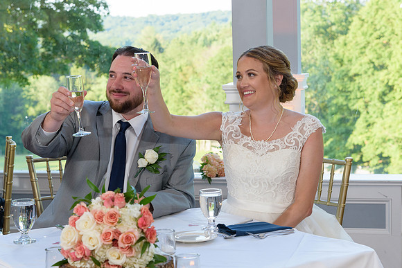 Bride and groom toasting at sweet heart table, Glastonbury Hills Country Club, Glastonbury, CT