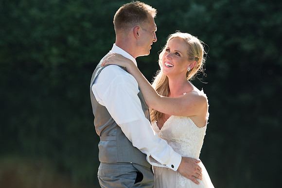 Bride and Groom in afternoon light for back yard tent wedding in West Hartford, Connecticut