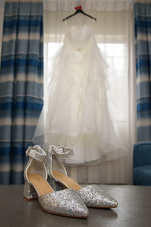 Wedding dress and shoes detail photo