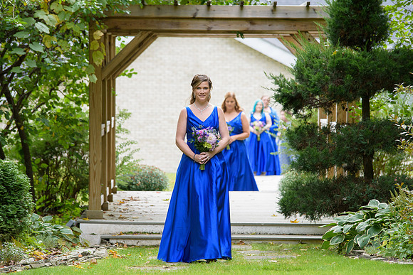 Bridesmaid walking down the aisle Crystal Peak Wedding Ceremony in Winstead Connecticut