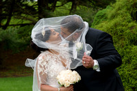 Bride and Groom kiss under the veil at Ethan Allen Hotel Wedding in Danbury, Connecticut
