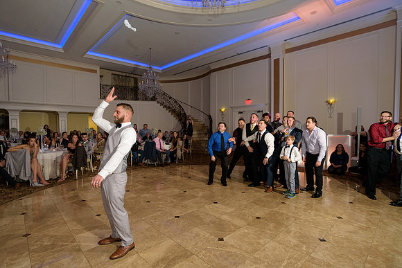 Garter toss at Aria Wedding Venue in Prospect Connecticut