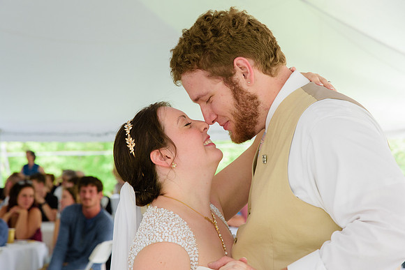 Bride and groom first dance and rubbing noses, Tent Wedding Connecticut