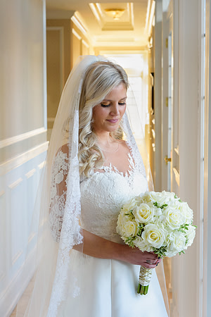 Bride with bouquet at the Madison Beach Hotel in Madison Connecticut