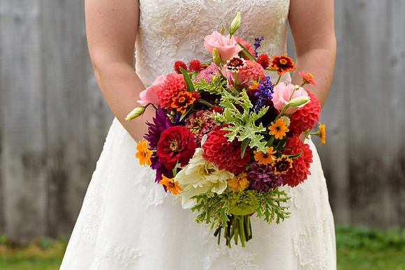 Bride with bouquet of flowers portrait at Goshen Connecticut Farm Wedding