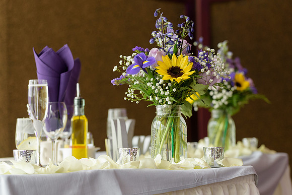 Sunflowers and purple flowers center pieces in mason jars, Waterview Wedding Reception Monroe, CT