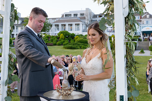 Bride and groom sand ceremony at the Water's Edge in Westport, Connecticut