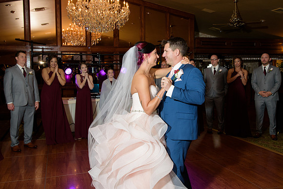 First Dance at Saint Clements Castle, Bride in Pink Dress and groom in blue suit, wedding reception