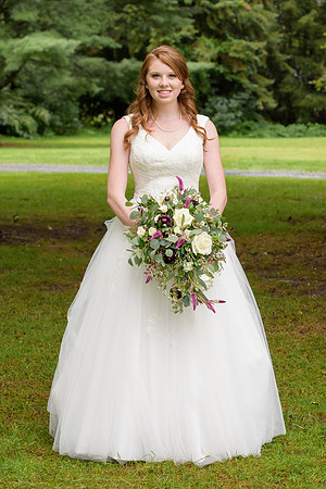 Bride with beautiful flowers at The Webb Barn in Wethersfield, Connecticut