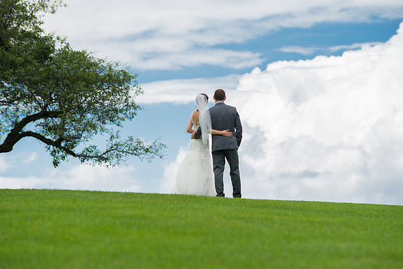 Bride and groom cloud portraits Topsmead State Park Litchfield, Connecticut