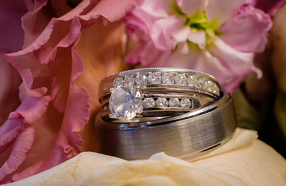 Wedding rings and bouquet detail photo at Torrington Connecticut Wedding Reception