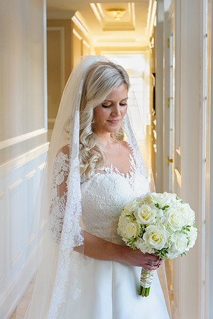 Bride with bouquet at the Madison Beach Hotel in Madison Connecticut