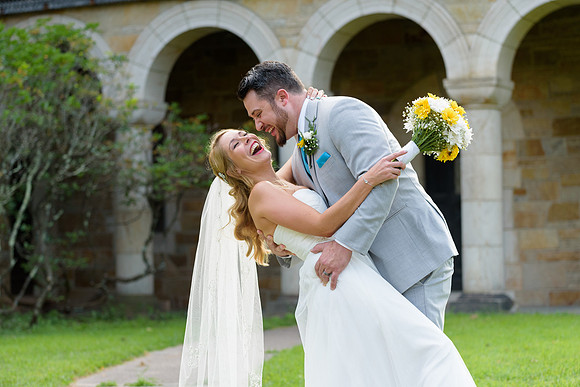 Bride and groom dipping for their wedding photos