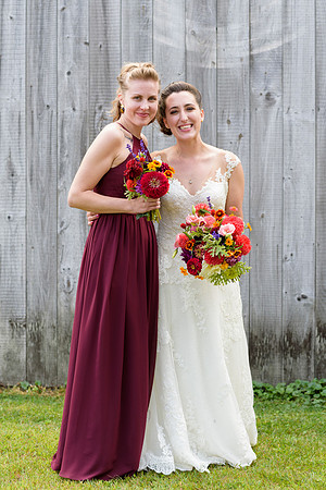 Bride and her bridesmaid portraits at barn farm wedding in Goshen, Connecticut