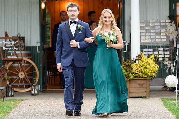 Wedding ceremony procession bridesmaid and groomsmen at Maneleeys in South, Windsor, CT