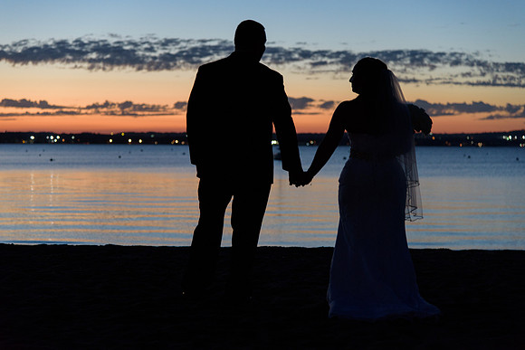 Bride and groom silutetted at Anthony's Ocean View in New Haven Connecticut